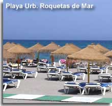 Sun loungers on the main beach of Roquetas de Mar