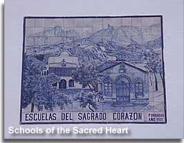 Image on the side of the church in Plaza Poveda of the Schools of the Sacred Heart in Guadix