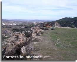 Fortress foundations on the hillside of Purchenas Alcazaba